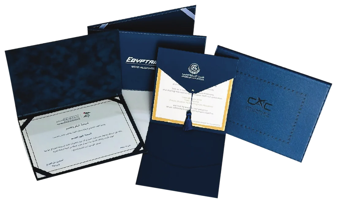 Navy certificate holders with foil marks and velvet lined interiors